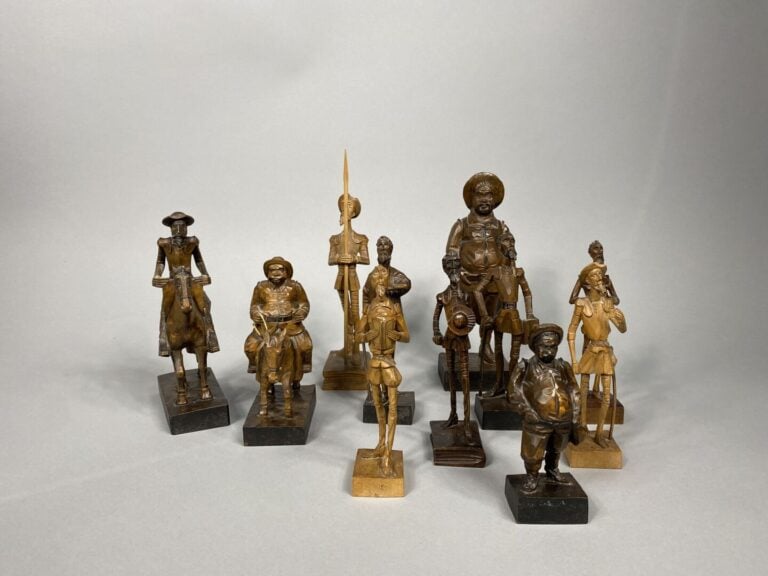 Important lot de sujets en bois sculpté figurant Don Quichotte et Sancho Panza…