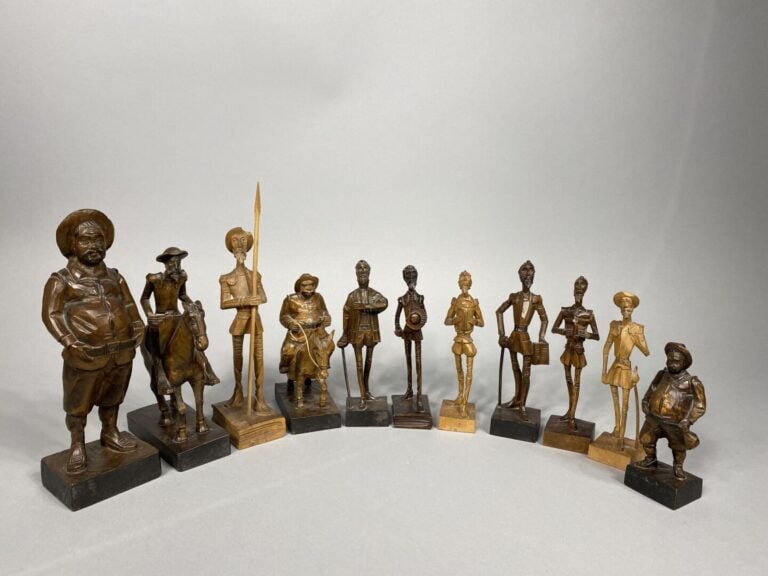Important lot de sujets en bois sculpté figurant Don Quichotte et Sancho Panza…