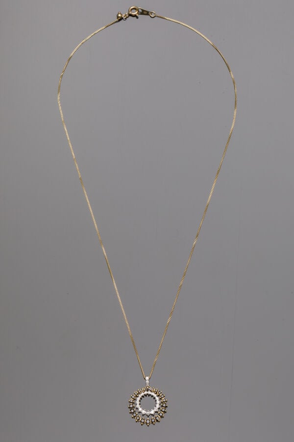 PENDENTIF circulaire et sa fine chaînette en or jaune et or gris (375‰) 9 carat…