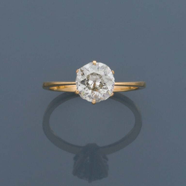BAGUE « solitaire » en or jaune (750‰) serti d'un diamant taille ancienne. Nomb…