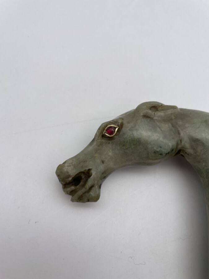 Poignard dit "Khandja" à poignée en jadéite sculptée stylisant un tête de cheva…