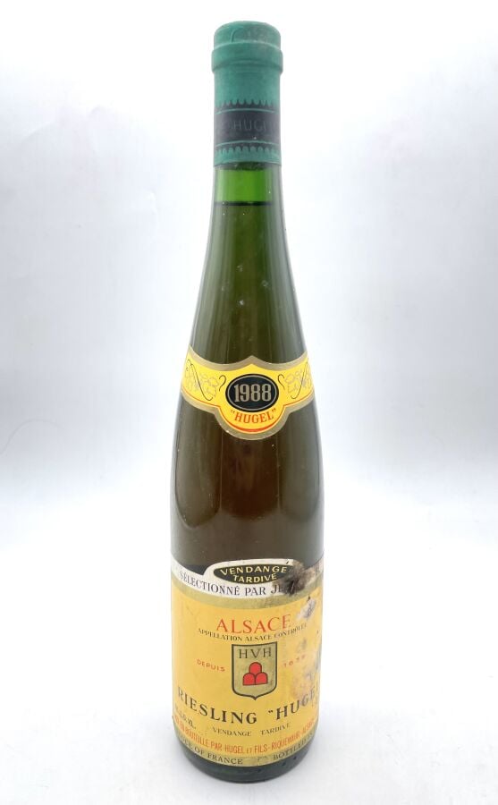 Une bouteille d'ALSACE - RIESLING Vendange tardive - HUGEL. 1988. Etiquette tac…