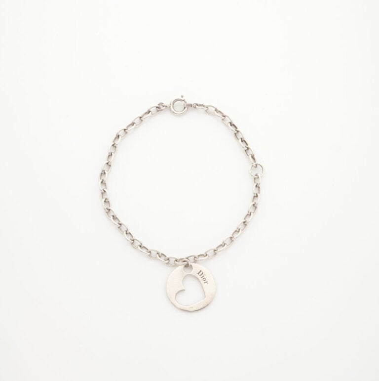 Christian DIOR - Bracelet en argent (925) agrémenté d'une pampille représentant…