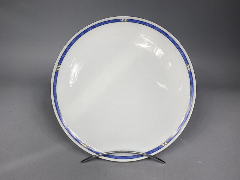 CHRISTOFLE - Service de table en porcelaine modèle "Alliance bleu" 45 pièces co…