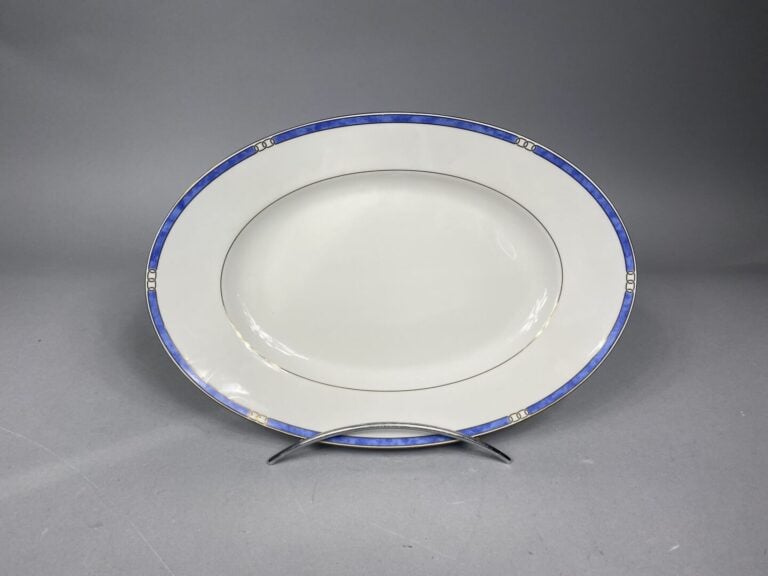 CHRISTOFLE - Service de table en porcelaine modèle "Alliance bleu" 45 pièces co…
