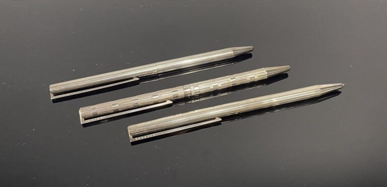 DUPONT - Lot de 2 stylos bille et un critérium en argent (925), le corps strié…