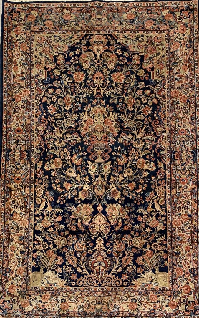 Iran - Tapis à décor de paradis terrestre, d'animaux en polychromie encadrant u…