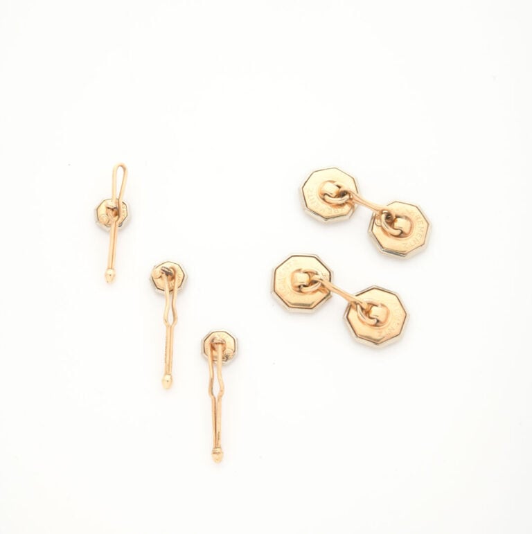 KREMENTZ - Paire de boutons de manchette de forme octogonale en métal doré orné…