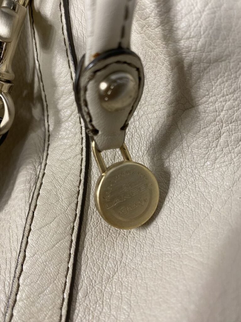 LANCEL - Sac seau en cuir beige - H : 31 cm - (petites taches, usures)