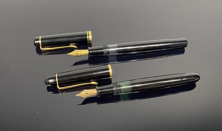 PELIKAN - Lot comprenant un stylo plume en résine noire, attributs en métal dor…