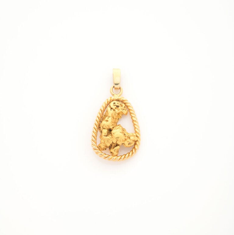 Pendentif pépite en or jaune (750), entourage tosadé - Poids : 12.6 g - H : 3 c…
