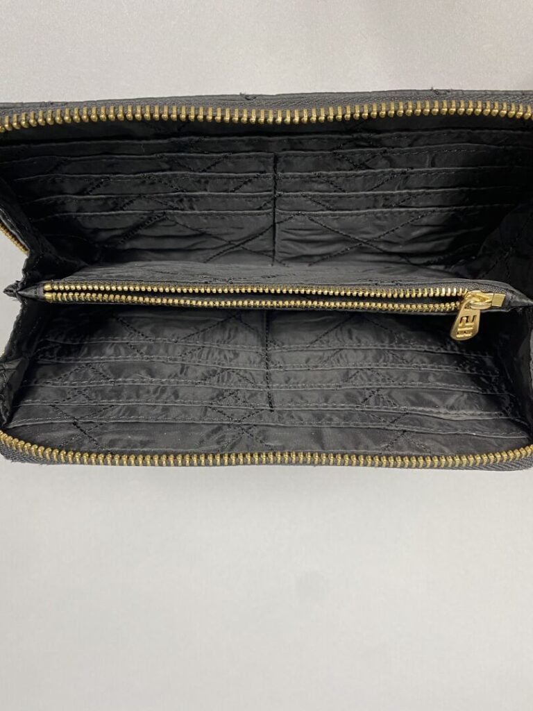 Sonia RYKIEL - Portefeuille noir à motif matelassé - 12.5 x 21 cm