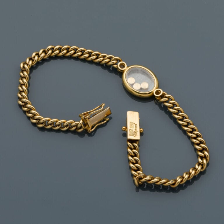CHOPARD - BRACELET gourmette en or jaune (750‰) centré d'un motif ovale serti d…