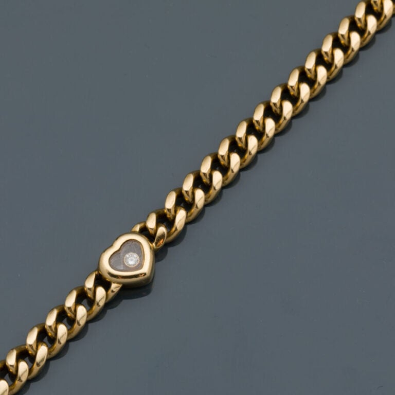 CHOPARD - BRACELET gourmette "Happy Diamond" en or jaune (750‰) composé d'un mo…