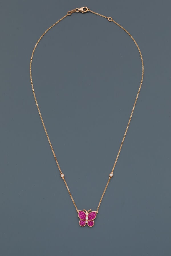 COLLIER "papillon" et sa chaînette en or rose (750‰) serti de diamants taille b…