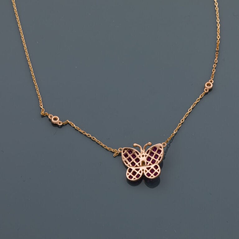 COLLIER "papillon" et sa chaînette en or rose (750‰) serti de diamants taille b…