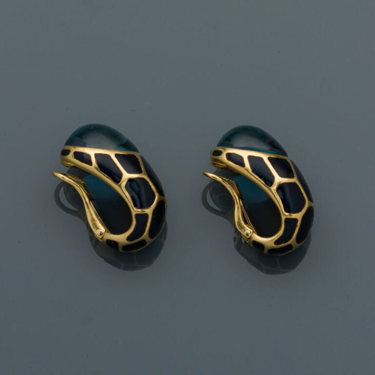 FRED - Importante paire de CLIPS d'OREILLES en or jaune (750‰) serti de topazes…