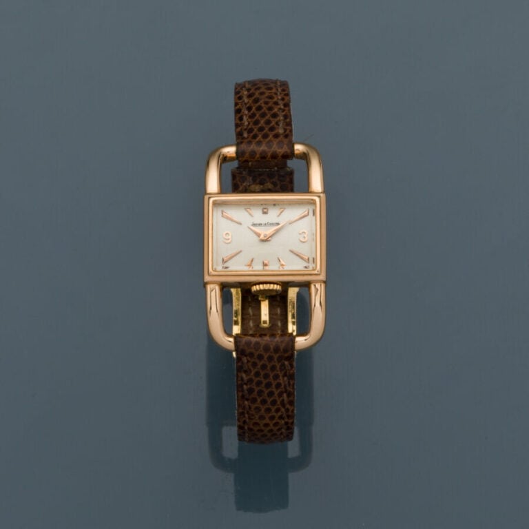 JAEGER LECOULTRE - BRACELET MONTRE "Etrier" en or rose (750‰). Attaches ajourée…