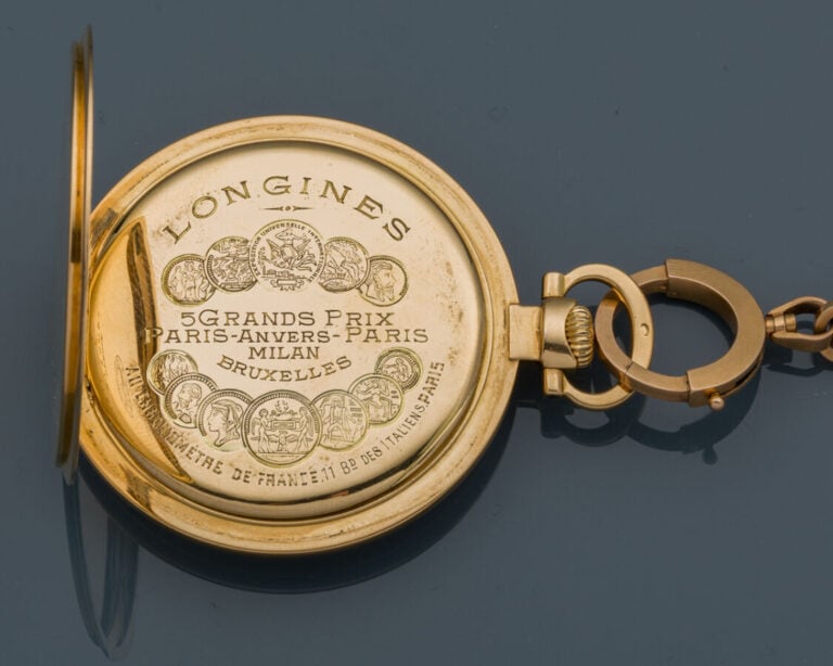 LONGINES - MONTRE de POCHE en or jaune (750‰) uni. Cadran satiné, double minute…