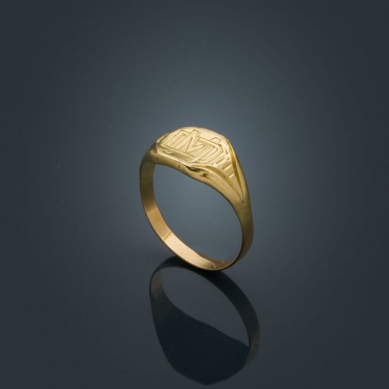LOT en or jaune et or rose (750‰) comprenant : - - une ALLIANCE. Poids : 1,9 g.…