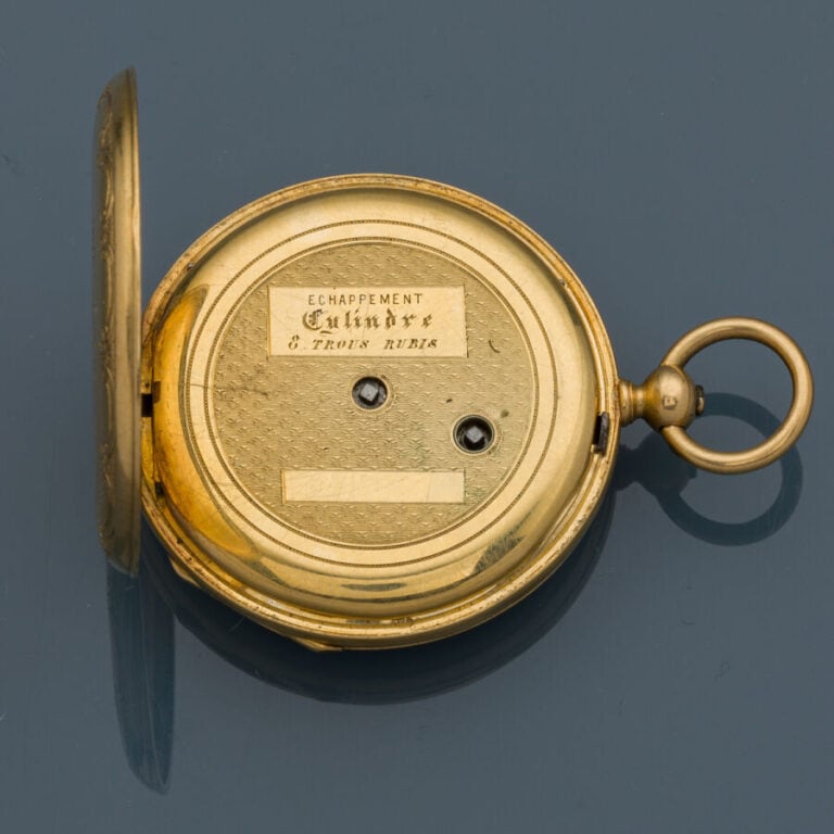LOT en or jaune et rose (750‰) guilloché et ciselé, comprenant une MONTRE de PO…