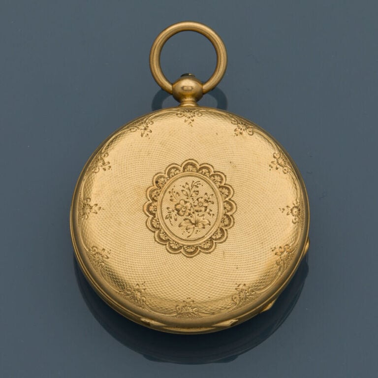 LOT en or jaune et rose (750‰) guilloché et ciselé, comprenant une MONTRE de PO…
