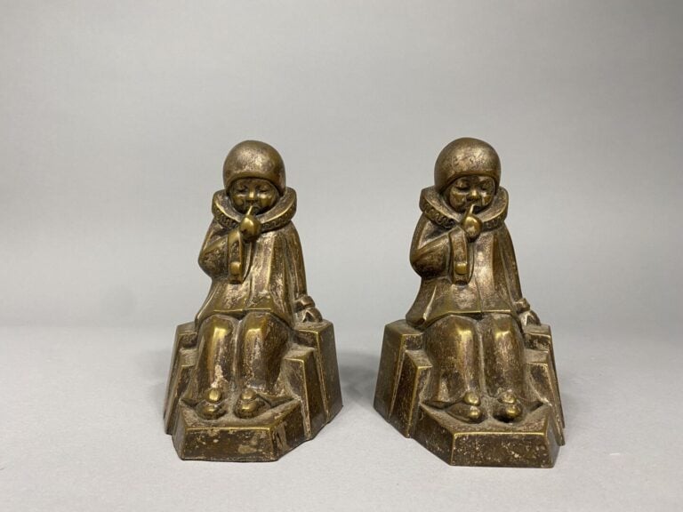 Louis FONTINELLE (1886-1964) - Paire de serre-livres en bronze patiné figurant…