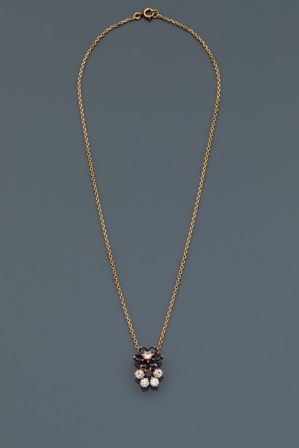 MAUBOUSSIN - COLLIER "deux fleurs" en or jaune (750‰) composé d'une chaînette r…