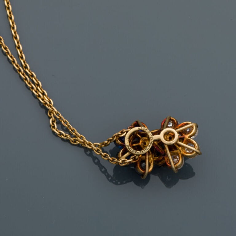 MAUBOUSSIN - COLLIER "deux fleurs" en or jaune (750‰) composé d'une chaînette r…