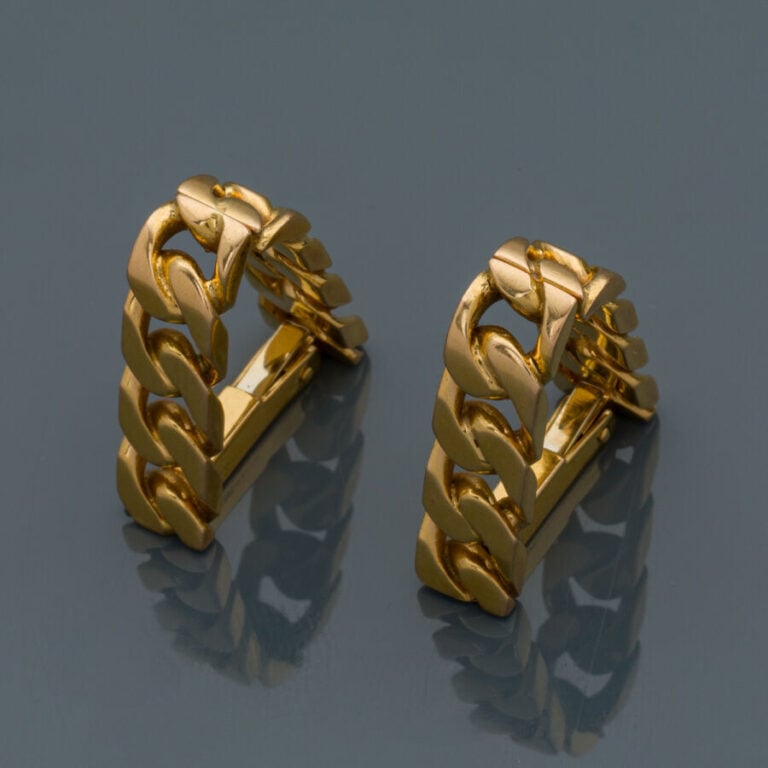 MAUBOUSSIN - Paire de BOUTONS de MANCHETTES "gourmette rigide" en or jaune (750…