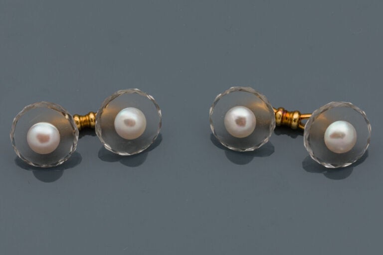 Paire de BOUTONS de MANCHETTES "circulaires" en or jaune et or gris (750‰) comp…