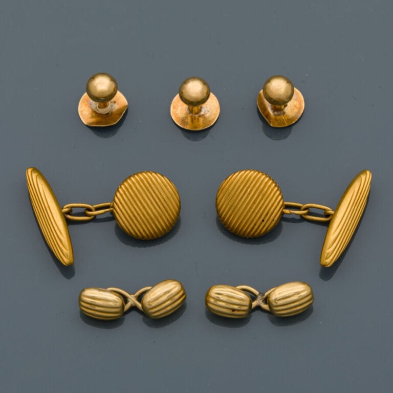 Paire de BOUTONS de MANCHETTES en or jaune (750‰) godronné. - Poids : 3,6 g. -…