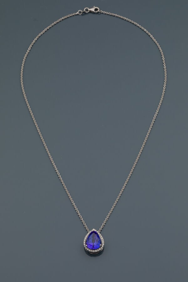 PENDENTIF "goutte" et sa chaînette en or gris (750‰‰) serti d'une tanzanite tai…