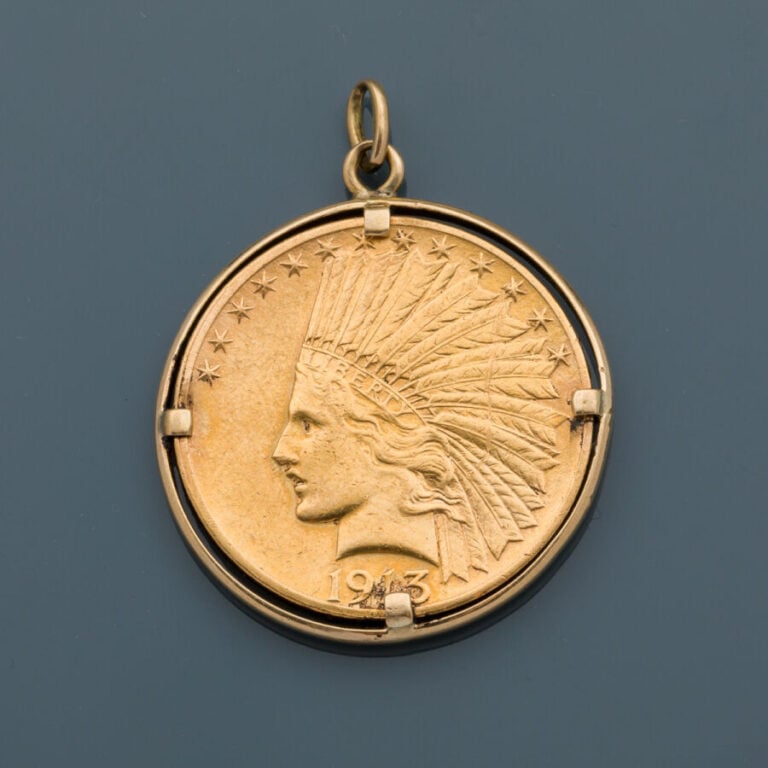 PENDENTIF "pièce" en or jaune (585‰) 14 carats, retenant une pièce de 10 dollar…