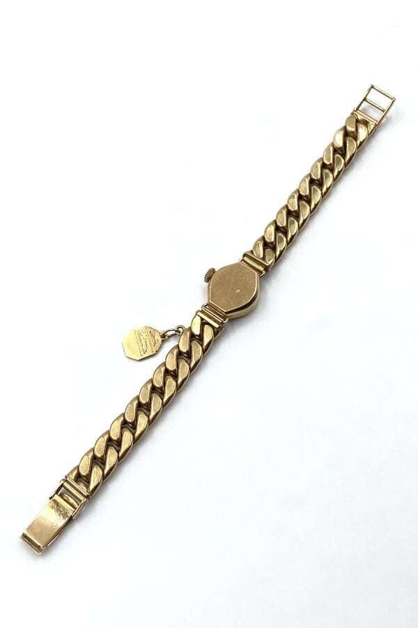 EMO - Montre de dame en or jaune , cadran de couleur blanche - Boitier poinçonn…