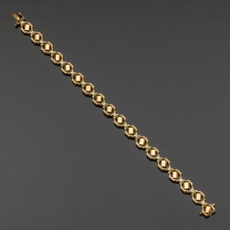 BRACELET en or jaune (585‰) 14 carats, articulé, à maille octogonale ajourée et…