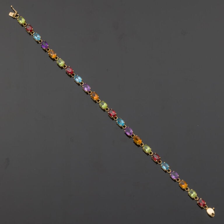 BRACELET en or jaune (585‰) 14 carats, serti de pierres précieuses multicolores…