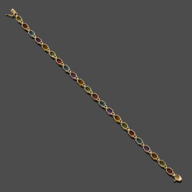 BRACELET en or jaune (585‰) 14 carats, serti de pierres précieuses multicolores…