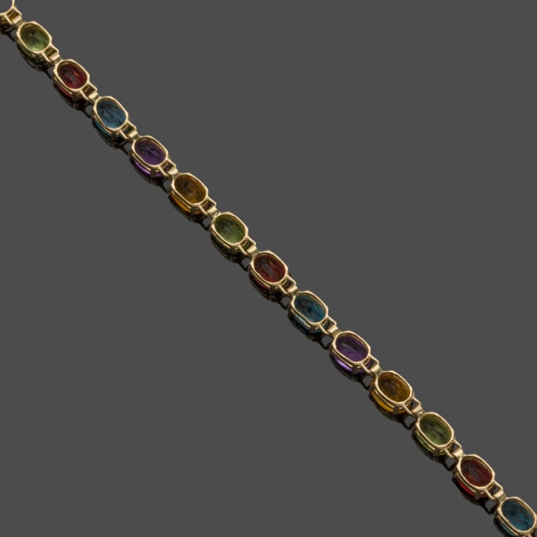 BRACELET en or jaune (585‰) 14 carats, serti de pierres précieuses multicolores…