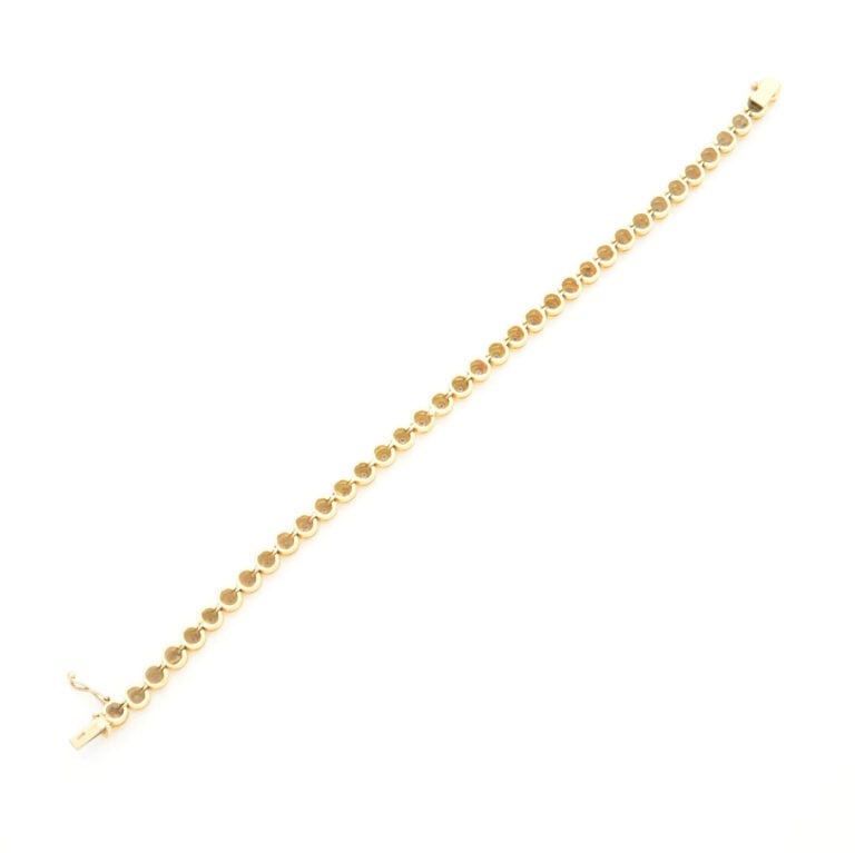 BRACELET en or jaune (750‰) serti de 35 diamants taille brillant en serti clos.…