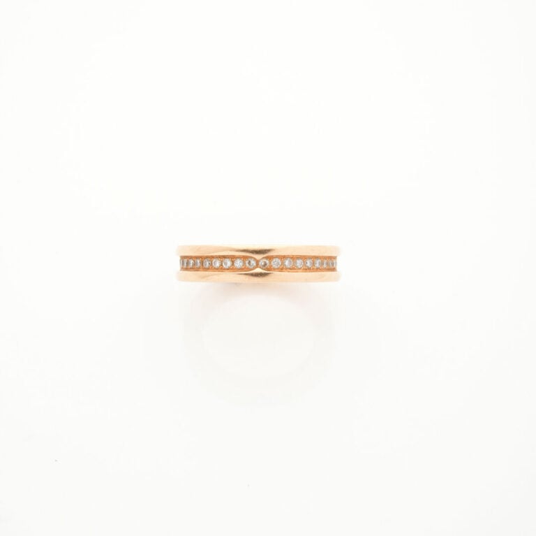 BULGARI - ALLIANCE, modèle "B., Zero" en or rose (750‰) gravé et serti d'un ali…