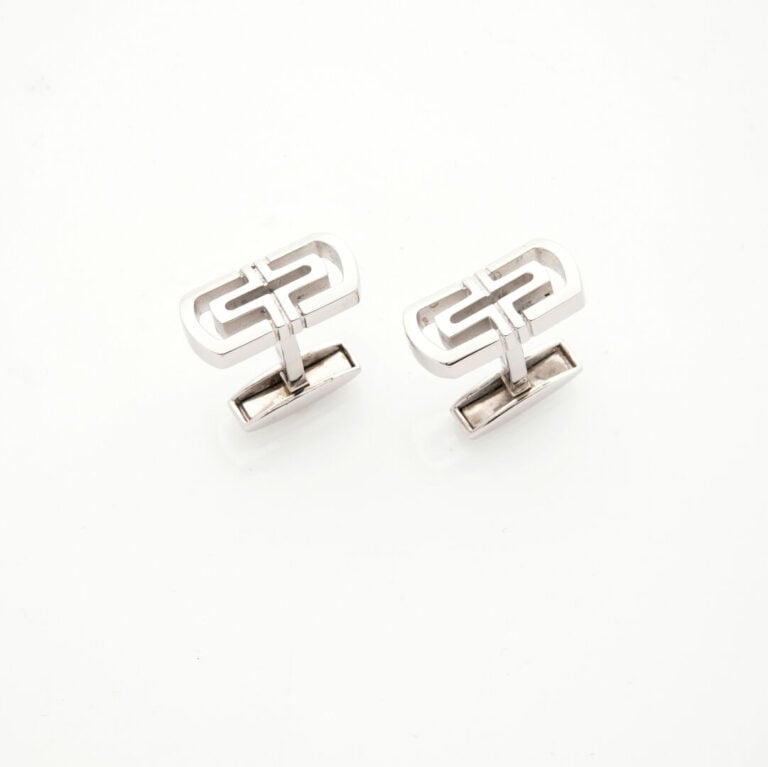 BULGARI - Paire de BOUTONS de MANCHETTES modèle "Parentesi" en argent (925‰) aj…