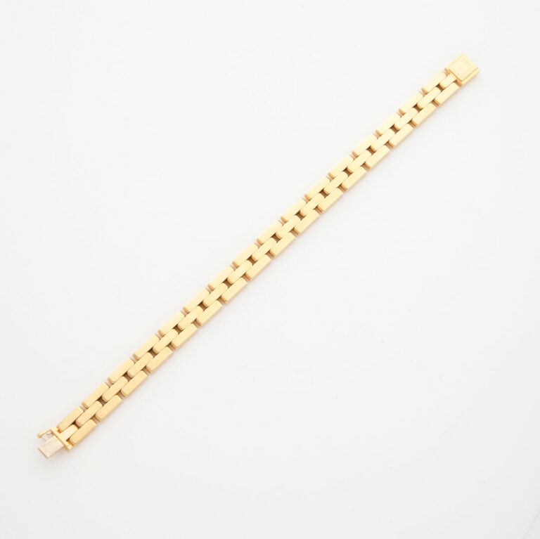 CARTIER - BRACELET "Panthère" en or jaune (750‰) articulé. - Signé CARTIER et n…