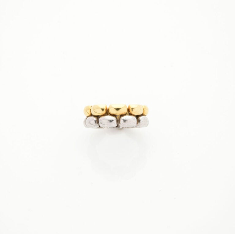 CHOPARD - BAGUE en or jaune (750‰) et argent (925‰) ajouré et bombé. - Signée C…