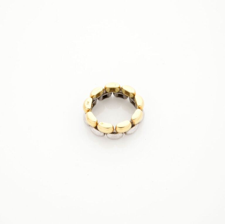 CHOPARD - BAGUE en or jaune (750‰) et argent (925‰) ajouré et bombé. - Signée C…