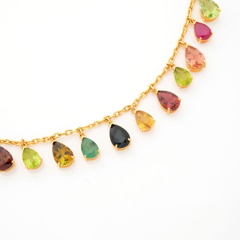 COLLIER en or jaune (750‰) composé d'une chaînette à maille forçat sertie 13 pi…