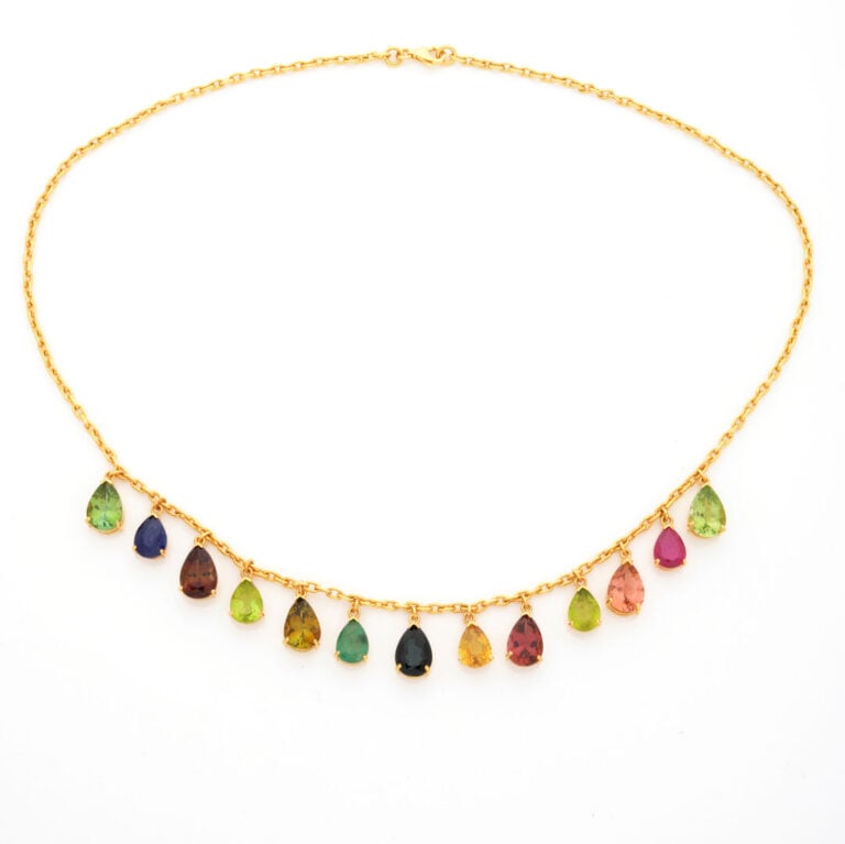 COLLIER en or jaune (750‰) composé d'une chaînette à maille forçat sertie 13 pi…