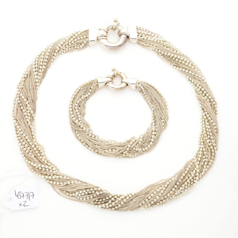 DEMI-PARURE en argent (min. 800‰) comprenant un COLLIER et un BRACELET composés…