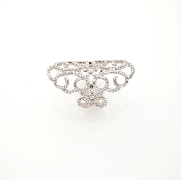 Large bague en argent (925) à motif ajouré de volutes soulignées de pierres bla…