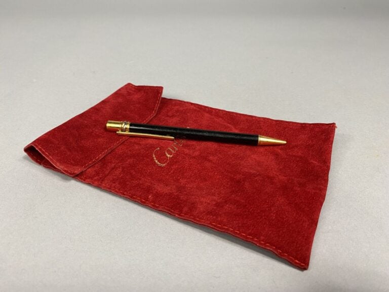 Must de CARTIER - Stylo à bille rétractable Trinity en métal doré laqué noir -…
